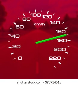 Speedometer over a blurred road representing driving very fast