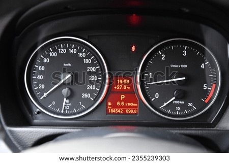 The speedometer unit of a car in closeup