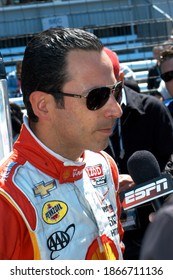 
Speedway, IN, USA - May 24, 2013: Three-time Indy 500 Winner Helio Castroneves Gets Interviewed During Carb Day Practice For The 2013 Indy 500.				