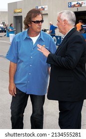 Speedway, IN, USA – May 26, 2006: Two-time Indy 500 Winner Arie Luyendyk (left) Chats With A Colleague On Carb Day At Indianapolis Motor Speedway.