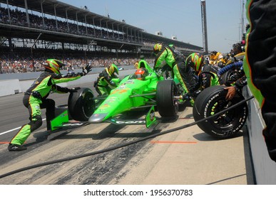 Speedway, IN, USA - May 27, 2012:  IndyCar driver James Hinchcliffe makes a pit stop during  the 2012 Indy 500 at Indianapolis Motor Speedway.