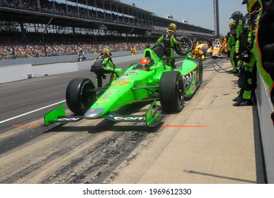 Speedway, IN, USA - May 27, 2012:  IndyCar driver James Hinchcliffe makes a pit stop during  the 2012 Indy 500 at Indianapolis Motor Speedway.