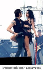 Speedway, IN/USA - May 22, 2015: Jane's Addiction Front Man, Perry Farrell, Performs With Backup Dancers At An Outdoor Concert In Indiana.