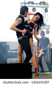 Speedway, IN/USA - May 22, 2015: Jane's Addiction Front Man, Perry Farrell, Performs With Backup Dancers At An Outdoor Concert In Indiana.