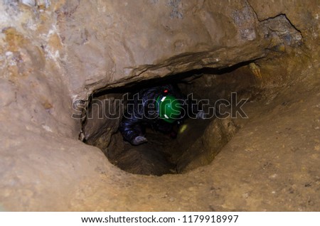 Speleologist inside the cave