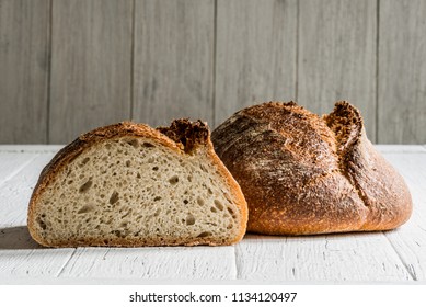 Spelt Quinoa Sourdough Bread On A White Table Board