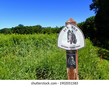 Spencer, Wisconsin, U.S.A.  July, 19, 2020  Ice Age Trail Marker Showing The National Scenic Trail Route