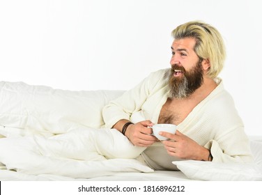 Spending Great Time At Home. Guy In Bath Clothes Hold Coffee. Morning Rituals. Tired Man Drinking Coffee. Every Morning Begins With Coffee. Bachelor In Bathrobe. Man With Beard In Dressing Gown.