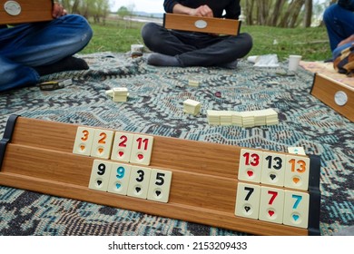 spending time playing okey at the picnic, close-up of the okey game and stones,