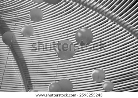 Spheres Against Curved Linear Patterns