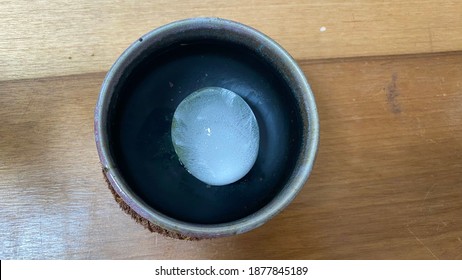 Spherical Ice In A Round Cup