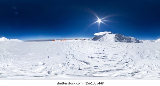 Spherical panorama of the Pamir mountain. Slope of Lenin Peak to an altitude of 6200 meters. Spherical panorama 360 degrees 180 Mountain hiker to climb a mountain of snow couloir.