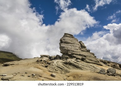 The Sphinx of Bucegi, in the Bucegi Plateau - Bucegi Natural Park, Carpathian Mountains, Romania - in a warm summer day.