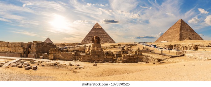 The Sphinx By The Great Pyramids Of Egypt Near The Ruins Of A Temple In Giza