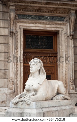 sphinx in front of massive door