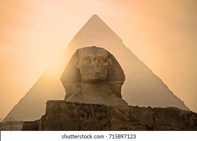 Sphinx In Front Of  Pyramid In Egypt. Giza Pyramid Complex. One Of Seven Wonders Of The World. 