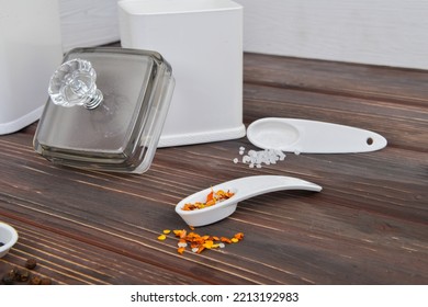 Spice Container Set On The Wooden Table.