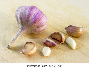 Spice, garlic, purple, wooden board, clove - Shutterstock ID 531948988