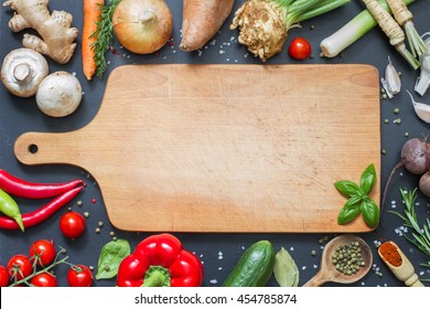 Spice Herbs And Vegetables Frame Food Background And Empty Cutting Board