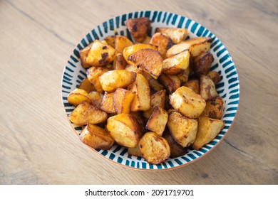 Spiced Crispy Roasted Potatoes Served In Bowl