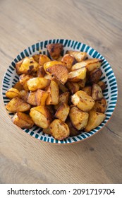 Spiced Crispy Roasted Potatoes Served In Bowl