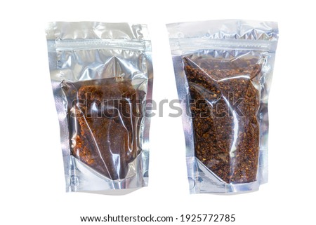 Spices, curry , curry paste or chili sauce in the bag on white background attach clipping path