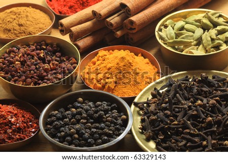 Spices and herbs in metal  bowls. Food and cuisine ingredients. Colorful natural additives.