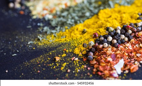Spices And Herbs On A Black Background