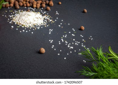 Spices On A Black Slate Stone. Allspice, Dill And Salt. Fresh Spices For Pickling. Selective Soft Focus. Organic Healthy Food.
