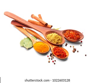 Spices. Spice in Wooden spoon. Herbs. Curry, Saffron, turmeric, cinnamon and other isolated on a white background - Powered by Shutterstock