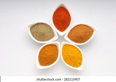 spices,Indian spices, color full spices in ceramic white bowls