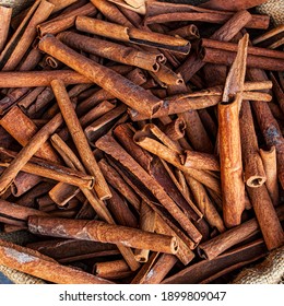 Spicy Aromatic Cinnamon Sticks Background