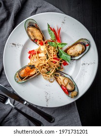 Spicy Asian Fusion Dish Of Spaghetti With Mussels