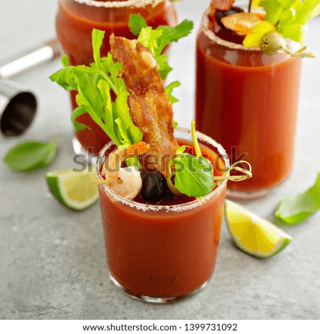 Spicy bacon bloody mary with variety of toppings