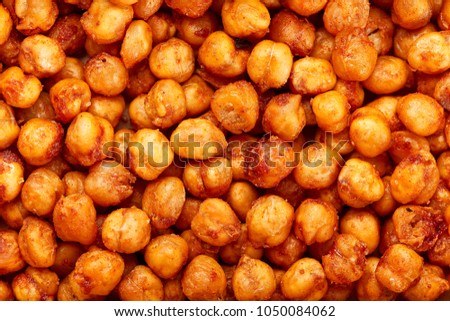 Spicy baked chickpeas. A moreish vegan snack, flavoured with smoked paprika, cumin and coriander.