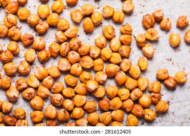 Spicy Baked Chickpeas Scattered On  Baking Paper