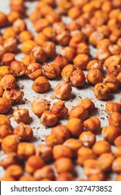 Spicy Baked Chickpeas Scattered On  Baking Paper