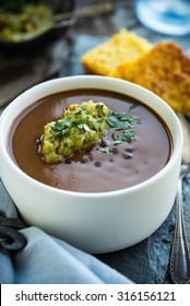 Spicy Black Bean Soup With Guacamole And Corn Bread