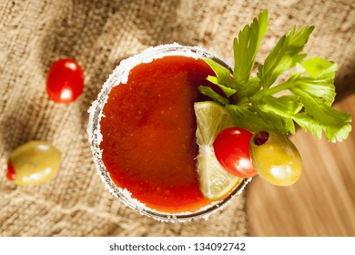 Spicy Bloody Mary Alcoholic Drink with a tomato garnish