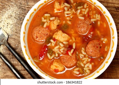 Spicy Cajun Chicken And Sausage Rice Gumbo On Table