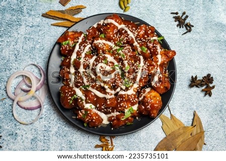 Spicy chicken Maharaja or chicken Moharaza served in a dish isolated on grey background top view of bangladesh food