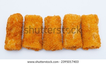 Spicy chicken risoles or risol ayam pedas or risoles ayam pedas stuffed with chicken and chili and enclosed in crape-like wrappers and rolled into bread crumbs and fried. isolated on white background.