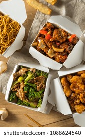 Spicy Chinese Take Out Food With Chopsticks And Fortune Cookies