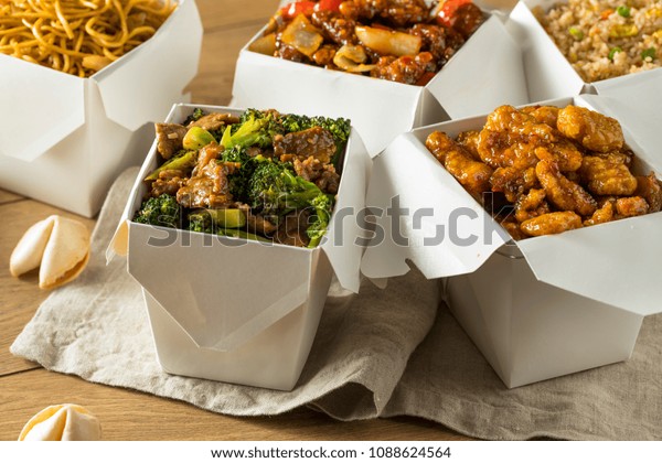 Spicy Chinese Take Out Food with Chopsticks and\
Fortune Cookies