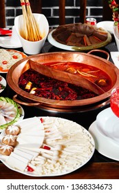 Spicy Chongqing Hotpot In A Full Table