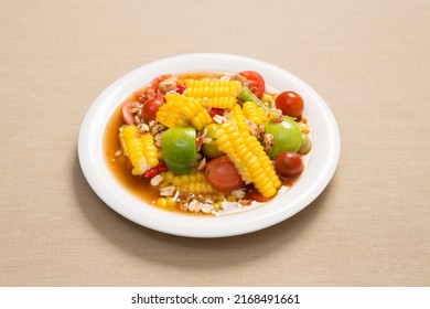 Spicy Corn Salad , Fresh Tomatoes And Bean With Lime And Chili (somtum), Thai Food.

