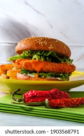Spicy crispy buffalo chicken sandwich with fries fancy fast food dinner