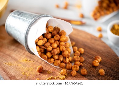 Spicy Crispy Roasted Chickpeas With Paprika, Curry And Hot Chili Pepper, Selective Focus. Tasty Vegetarian And Vegan Chickpea Snack.