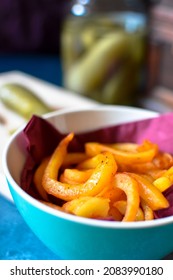 Spicy Curly Fries In A Bowl On A Table