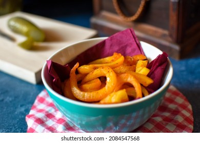 Spicy Curly Fries In A Bowl On A Table